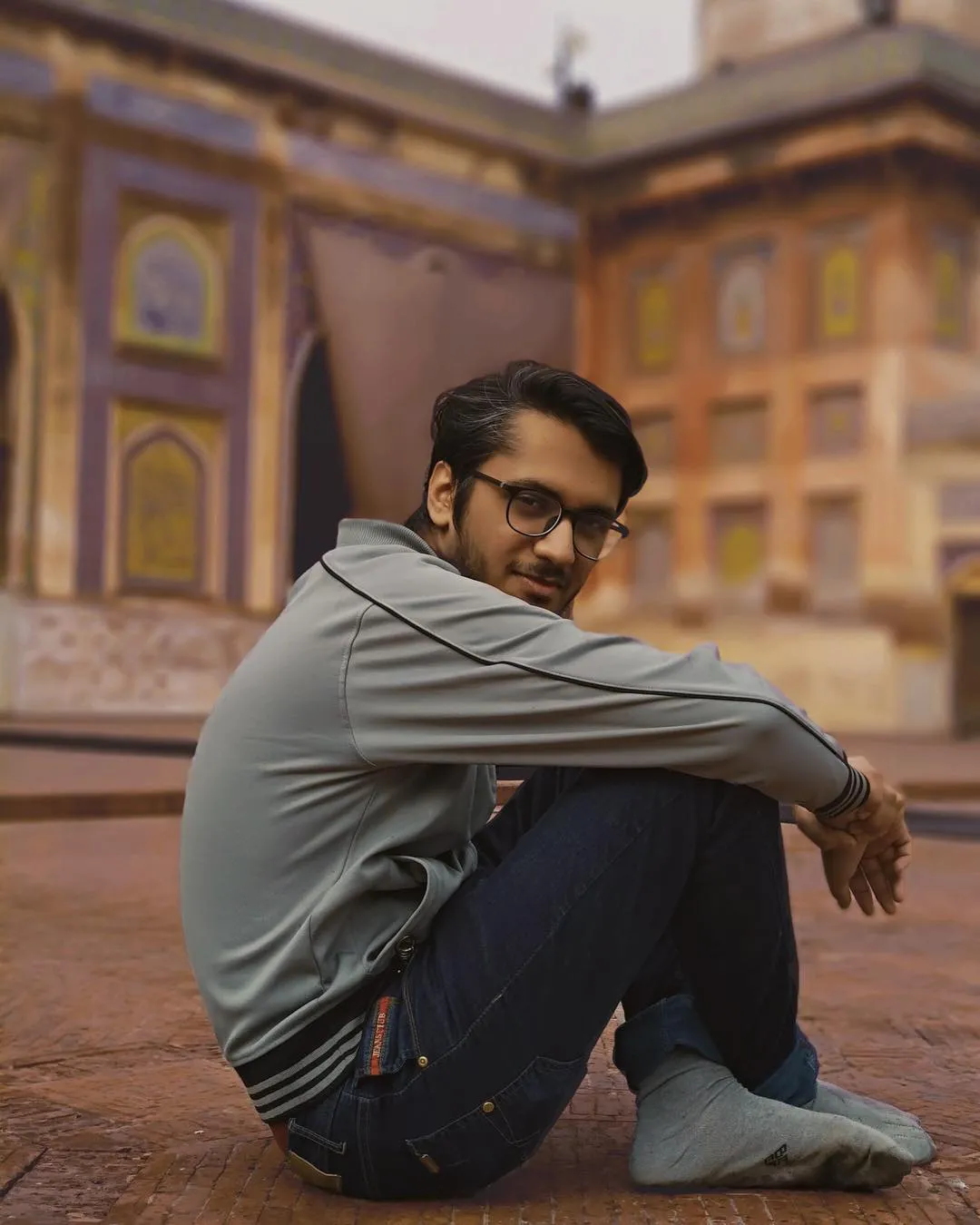 Farrukh sitting in the Masjid Wazir Khan courtyard, Lahore
